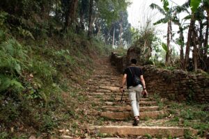 Hiking to Peace Pagoda from Fewa Lake, Pokhara. A very peaceful, clean and green walkthrough path. To reach this place, take a boat from Fewa Lake, cross the lake and you will reach the place. A beautiful place to travel with waterfall on the way.